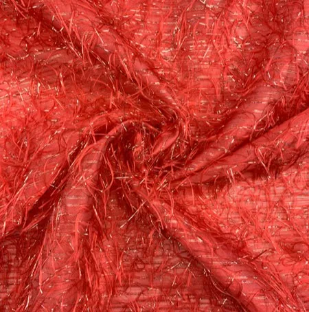 Fluffy jaquard  koraal met lurex  - The Fashion Basement